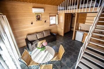 Фото номера Апартаменты Holiday с сауной Комплексы для отдыха с коттеджами/бунгало Holiday Complex Avoti г. Валмиера 9
